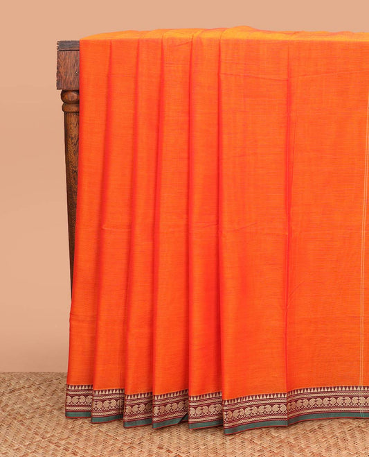 Orange plain Narayanpet cotton saree, contrast traditional border, and striped pallu