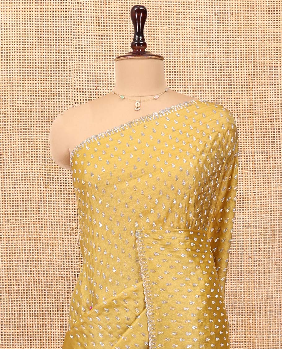 Mustard Designer Saree, Spotlighted with Stone Work All Over Its Body, Intricately Stone Woven Pallu, and Paired with a Matching Blouse