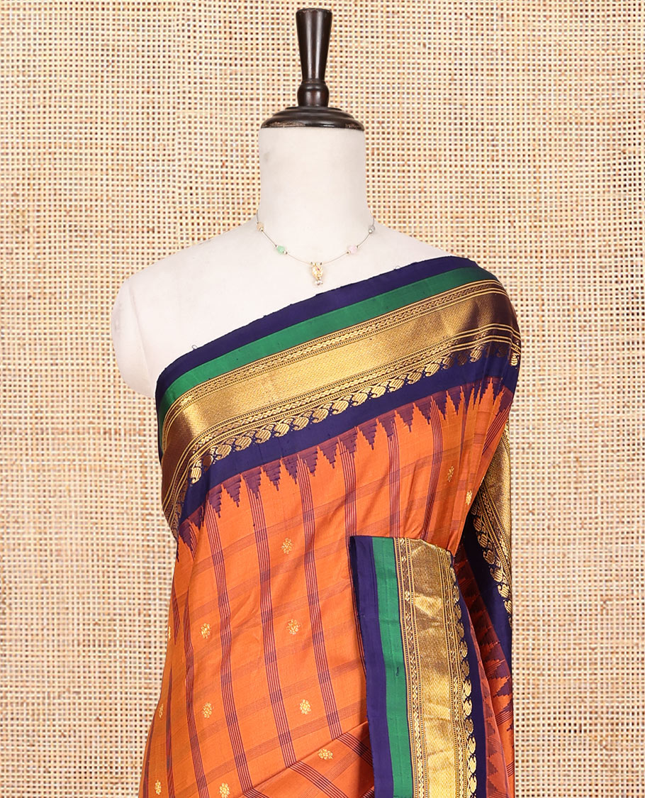 Orange Gadwal Silk Saree, Crafted with Buttas and Checks, Complemented by a Contrast Traditional Zari Temple Border, Grand Jaal Pallu, and a Contrast Blouse
