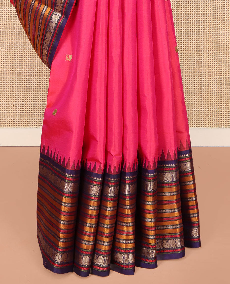 Pink Kanchipuram Silk Saree, Artfully Designed with Mayil Buttas on Its Body, Complemented by a Contrast Border of Rekku, Rudraksham, Mayil, and Kathir Designs, Pallu Steeped with Geometric Designs, and Paired with a Contrast Blouse