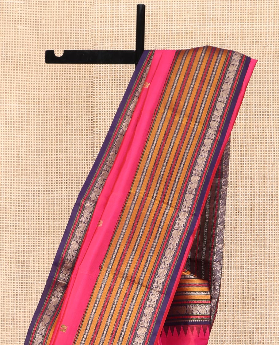Pink Kanchipuram Silk Saree, Artfully Designed with Mayil Buttas on Its Body, Complemented by a Contrast Border of Rekku, Rudraksham, Mayil, and Kathir Designs, Pallu Steeped with Geometric Designs, and Paired with a Contrast Blouse