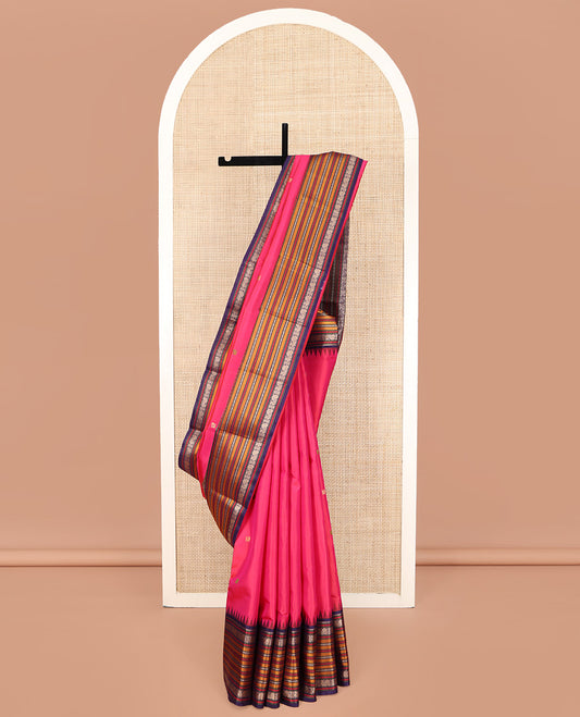 Pink Kanchipuram Silk Saree, Artfully Designed with Mayil Buttas on Its Body, Complemented by a Contrast Border of Rekku, Rudraksham, Mayil, and Kathir Designs, Pallu Steeped with Geometric Designs, and Paired with a Contrast Blouse