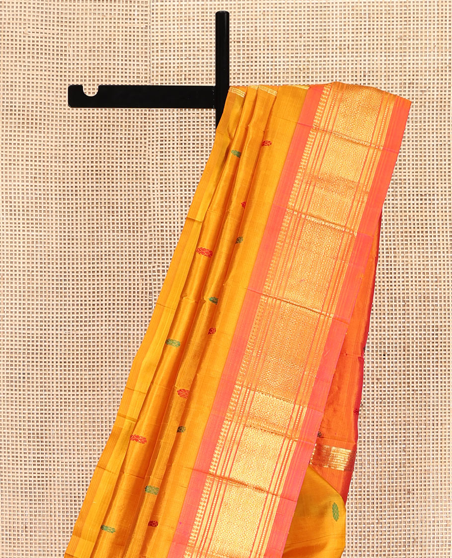 Orange Kanchipuram Silk Saree, Woven with Thread Buttas, Contrast One-Sided Border of Panner Sombu, Banaras, Muthu, and Jaal Designs, Zari Design Pallu, and No Blouse