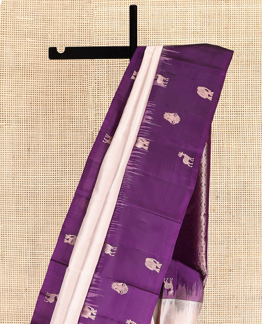 Off-White Kanchipuram Silk Saree, Sparsely Woven with Stripes, Complemented by a Contrast Border Features Yaanai, Maan, and Iruthalai Pakshi, Jaal Pallu, and a Contrast Blouse