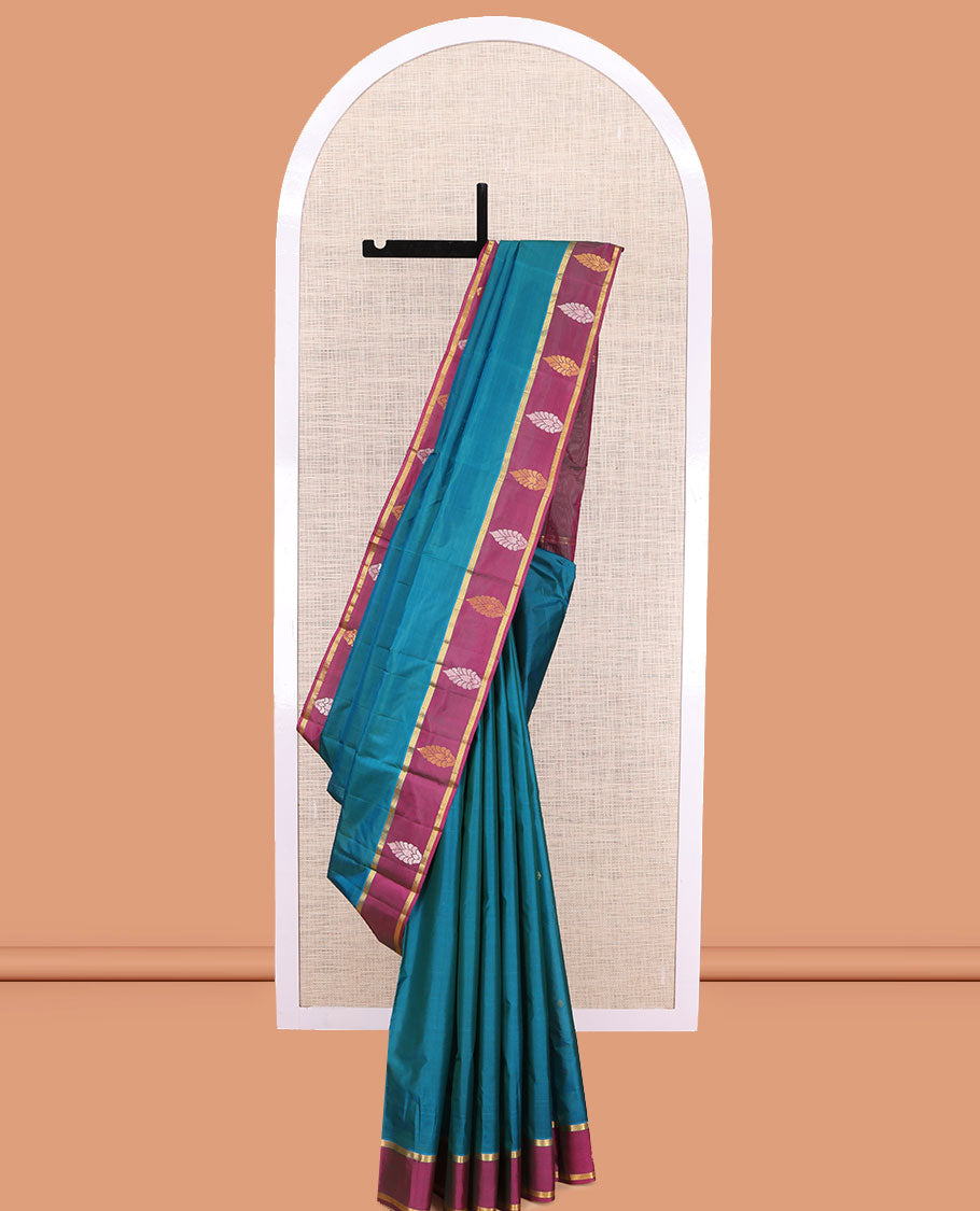 Blue Kanchipuram Silk Saree, Woven with Zari Buttas, a Contrast Traditional Zari Border, Zari Design Pallu, and a Contrast Blouse
