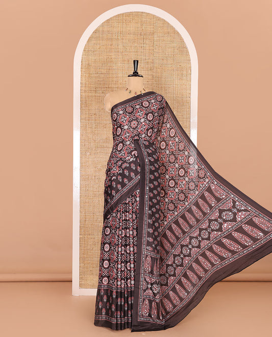 Brown Ajrakh style printed with mirror work masakali saree, printed border, intricately printed pallu, and a matching printed blouse