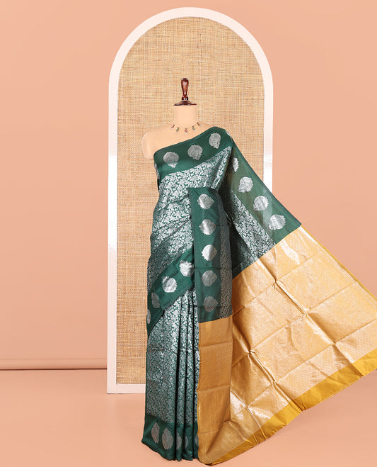 Bottle Green Art Kanchi Silk Saree Features Jacquard Design, a Zari-Motif Border, Contrast Intricate Pallu, and a Contrast Blouse