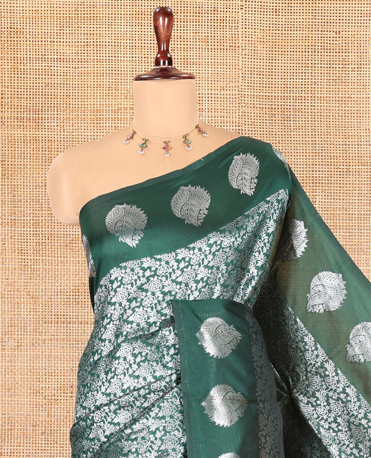 Bottle Green Art Kanchi Silk Saree Features Jacquard Design, a Zari-Motif Border, Contrast Intricate Pallu, and a Contrast Blouse