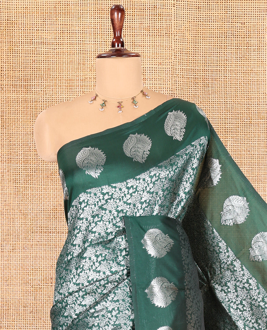 Bottle Green Art Kanchi Silk Saree Features Jacquard Design, a Zari-Motif Border, Contrast Intricate Pallu, and a Contrast Blouse