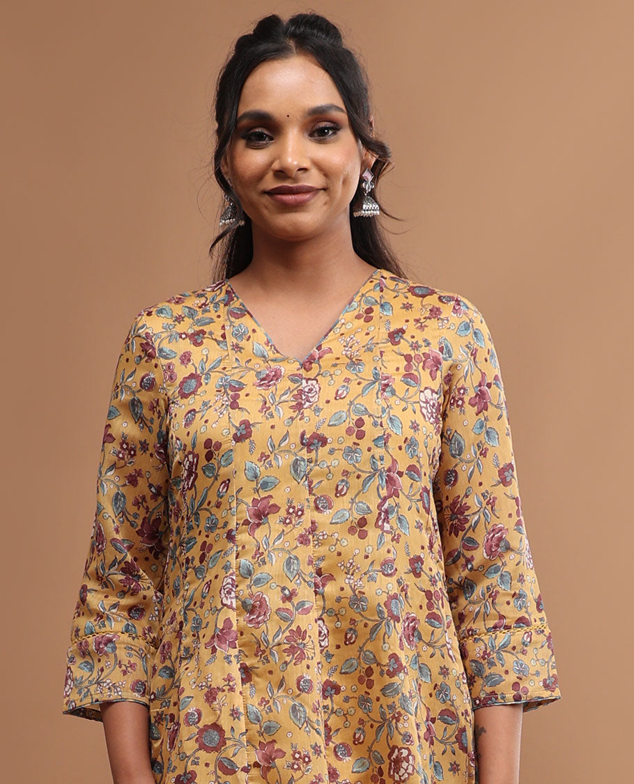 Mustard floral design v neck, 3/4 th sleeve, below knee lenght top with straight pants & floral printed dupatta