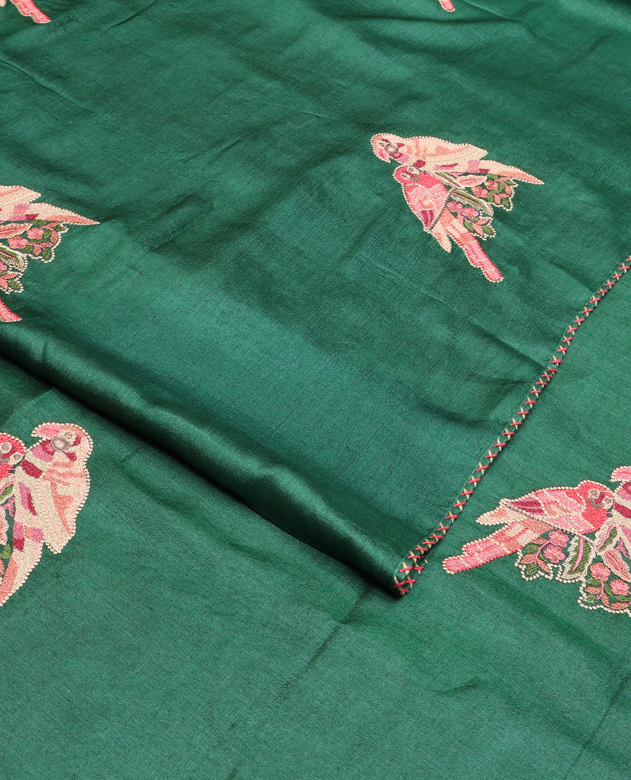 Borderless dark green macaw parrot motifs multi-colored thread embroidered tussar saree
