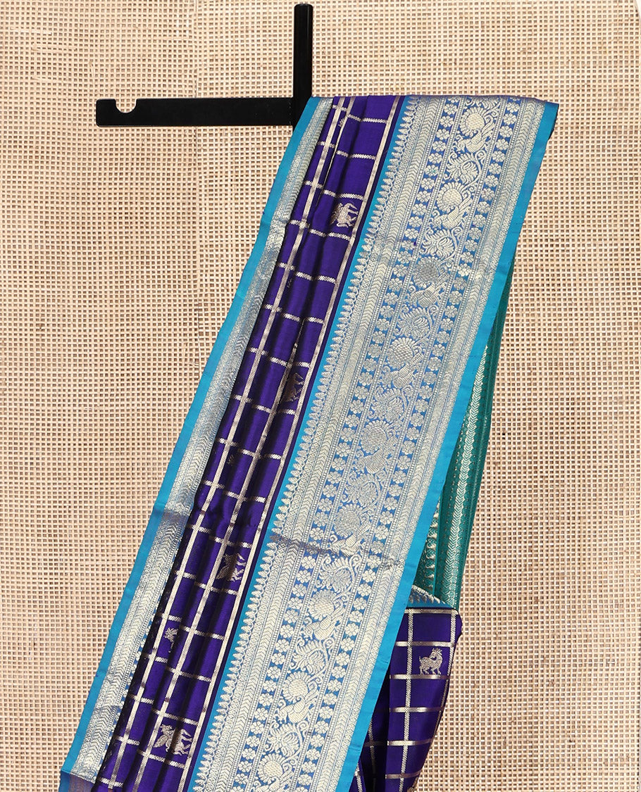 Blue Venkatagiri Silk Saree, Gleamed Up with Zari Butta Enclosed Checks All Over Its Body, Complemented by a Contrast Traditional Zari Design Border, Pallu of Traditional Designs, and Paired with a Contrast Blouse