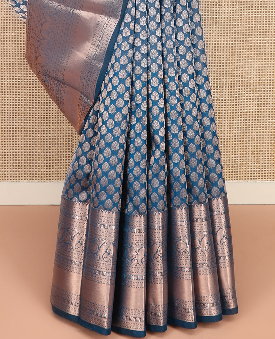 Blue Kanchipuram Wedding Silk Saree Gracefully Embellished with Zari Buttas, Highlighted with Zari Border of Thilakam, Star Vanki, Yaanai, and Round Mayil Designs, Majestically Zari-Woven Pallu, and Paired with a Matching Blouse