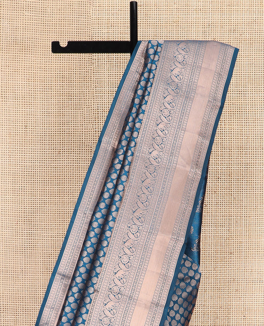 Blue Kanchipuram Wedding Silk Saree Gracefully Embellished with Zari Buttas, Highlighted with Zari Border of Thilakam, Star Vanki, Yaanai, and Round Mayil Designs, Majestically Zari-Woven Pallu, and Paired with a Matching Blouse