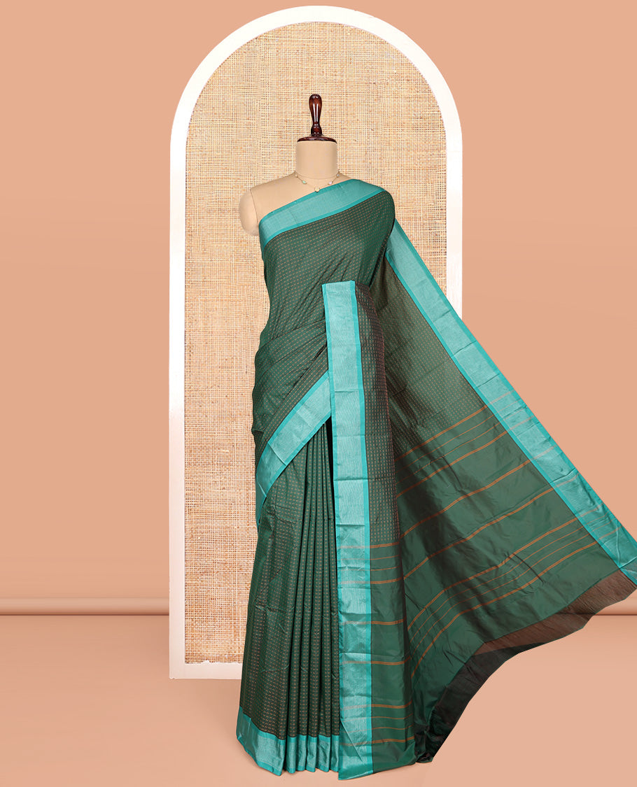 Green Aarani Gift Saree, Adorned with Plus-Shaped Buttas on Its Body, Complemented by a Contrast Striped Border, Subtle Striped Pallu, and Paired with a Matching Blouse