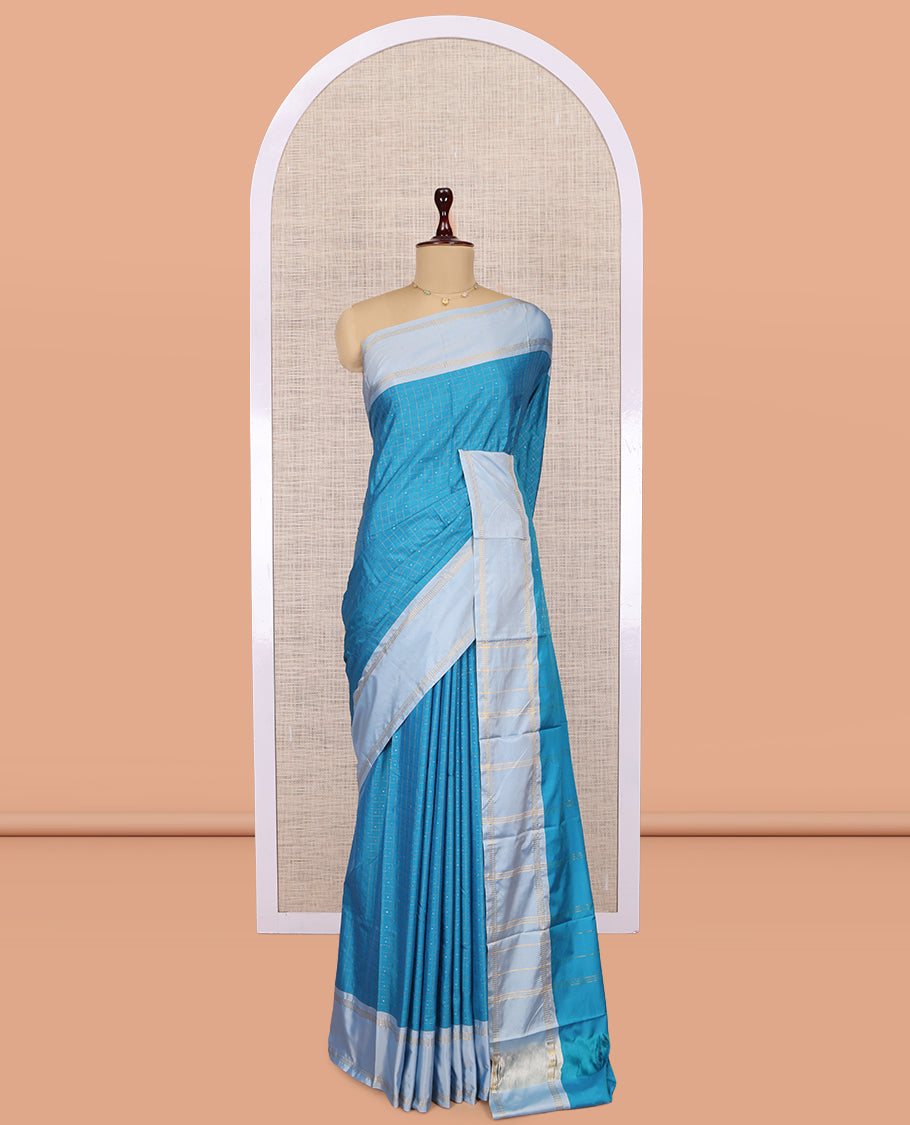 Blue Arani Saree, Features Zari Butta Enclosed Checks, a Contrast Bodi Border, Pallu of Zari Stripes, and a Matching Blouse
