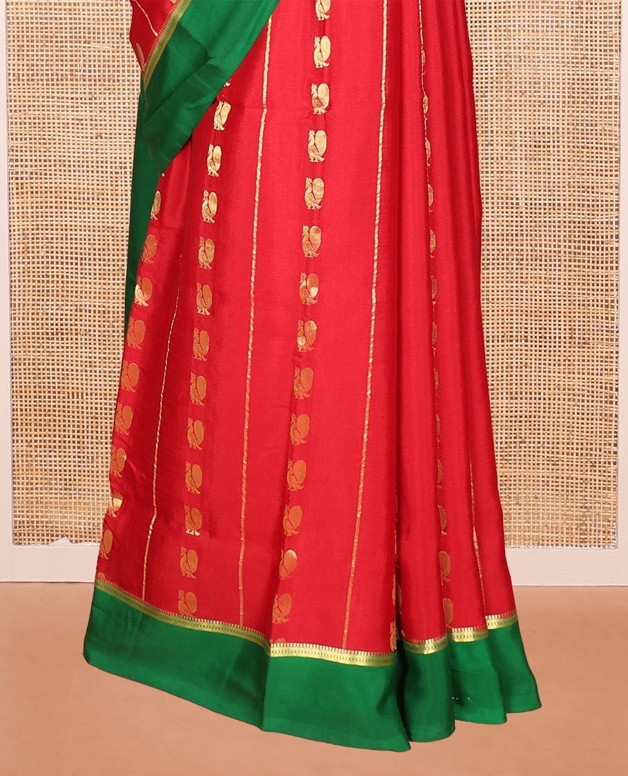 Red Mysore Silk Saree, Gracefully Adorned with Peacock Buttas and Stripes Across Its Body, Complemented by Contrast Border, Pallu Steeped with Traditional Zari Designs, and Paired with a Contrast Blouse