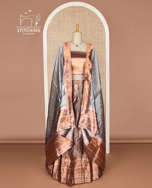 Dark brown floral buttas tissue half saree with contrast zari design border, floral design blouse & floral design dhavani