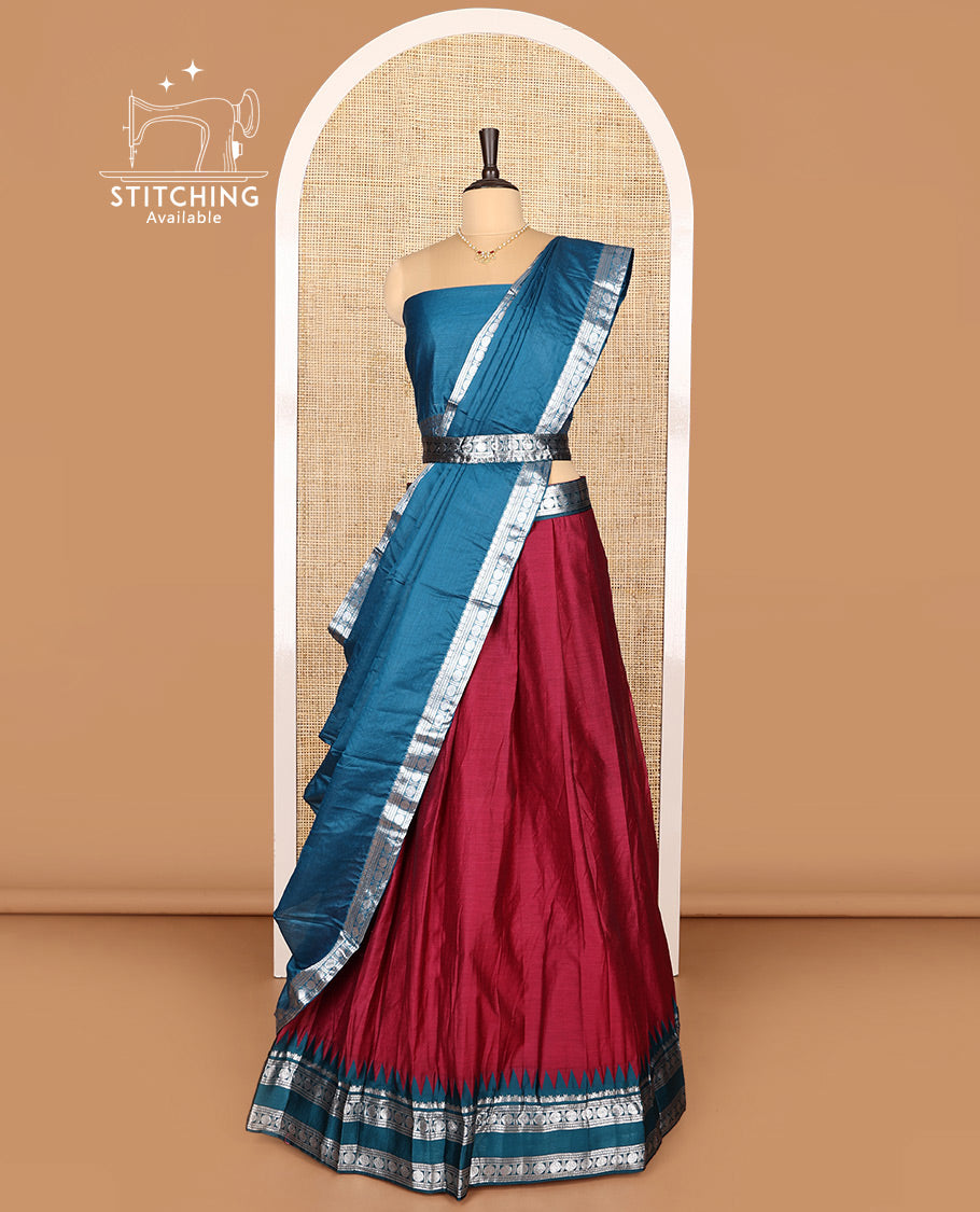 Wine Art Silk Half-Saree Featuring Plain Skirt, Complemented by Contrast Traditional Zari Design Rettai Pettu Temple Border, Paired with a Contrast Blouse, Contrast Zari-Bordered Dhavani and Brocade Belt
