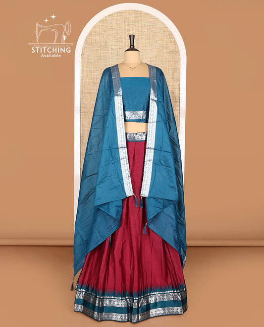 Wine Art Silk Half-Saree Featuring Plain Skirt, Complemented by Contrast Traditional Zari Design Rettai Pettu Temple Border, Paired with a Contrast Blouse, Contrast Zari-Bordered Dhavani and Brocade Belt