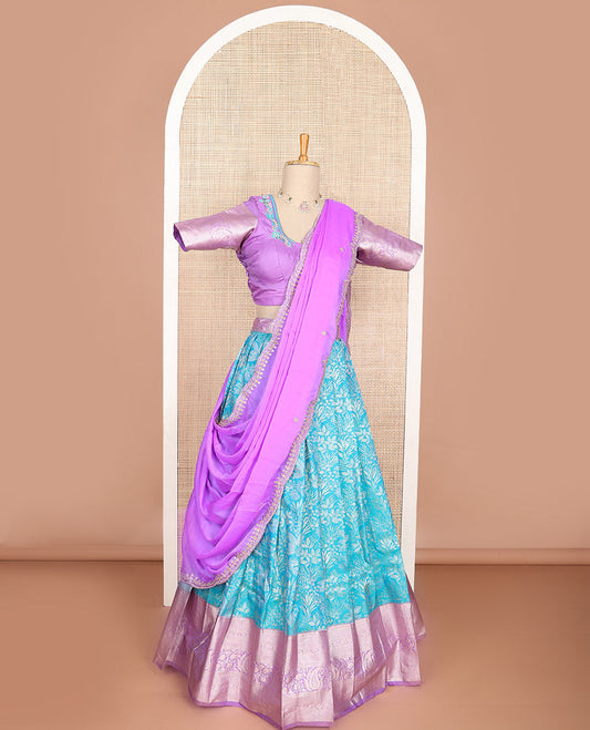Blue floral art silk half saree with contrast zari design border, embroidered blouse & floral embroidery dhavani