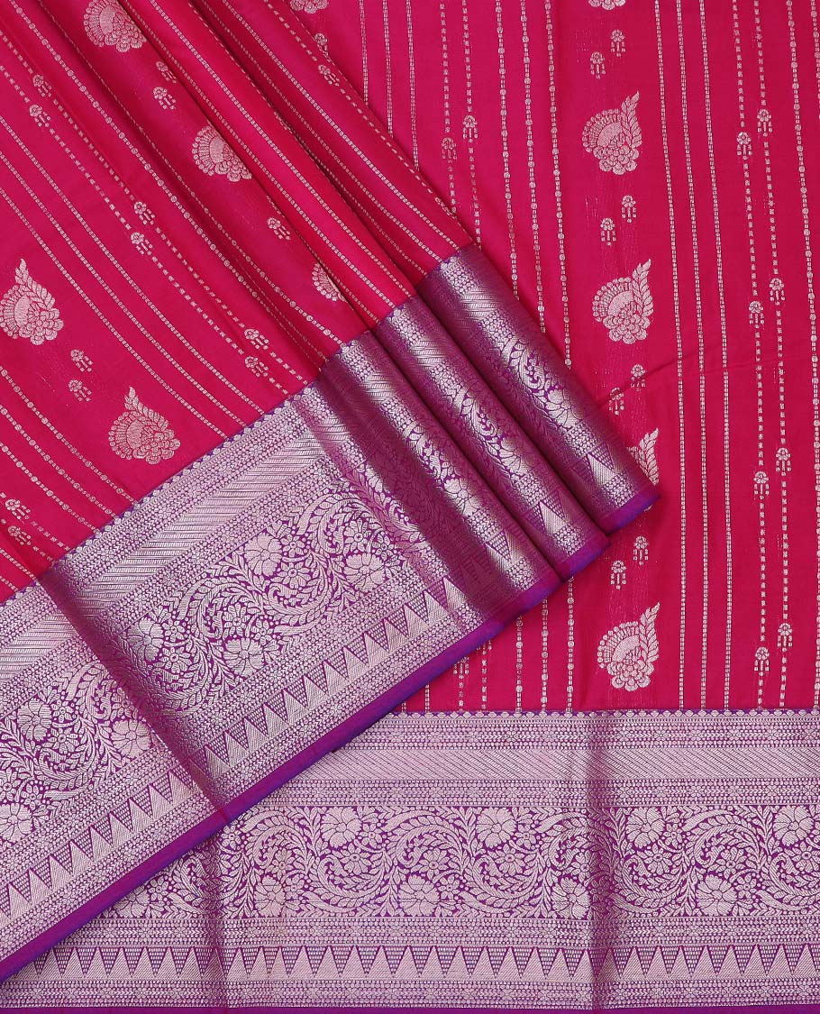 Red art silk pavadai material, zari design with contrast traditional zari bordered skirt, and a contrast bordered blouse