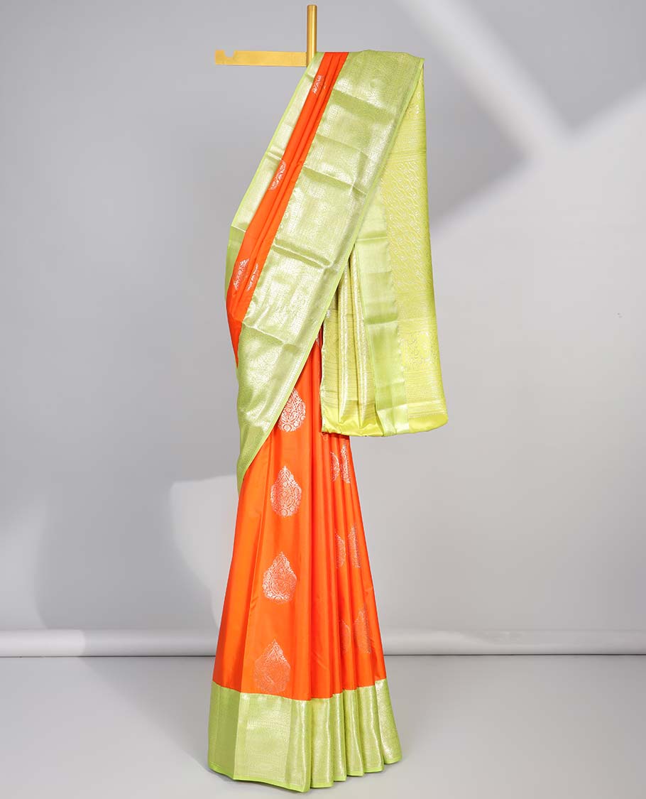 Orange floral motifs gift saree with contrast paisley border & intricate zari design pallu
