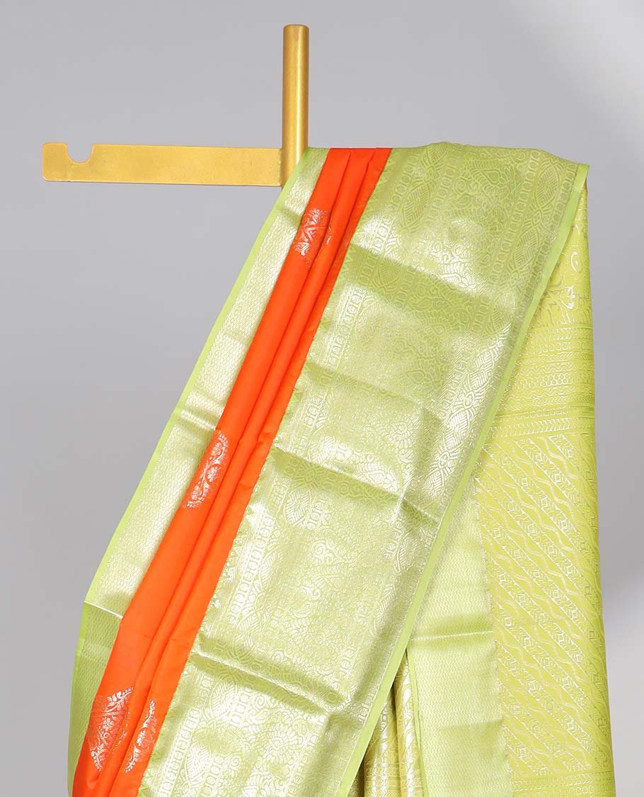 Orange floral motifs gift saree with contrast paisley border & intricate zari design pallu