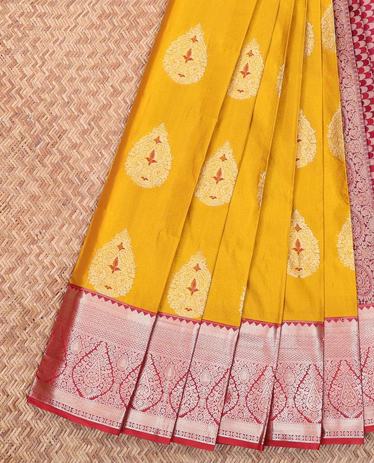 Yellow Budget Silk Saree, Beautifully Bedecked with Zari Buttas All Over Its Body, Complemented by a Contrast Traditional Zari Design Border, Pallu of Geometric Designs, and Paired with a Contrast Blouse