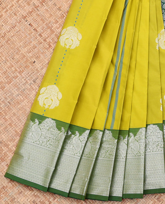Green Budget Silk Saree, Prettified with Zari Buttas on Its Body, Complemented by a Contrast Traditional Zari Border, Grand Ogee Patterned Pallu, and Paired with a Contrast Blouse