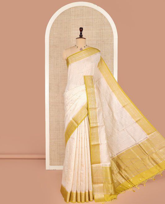 Sandal Assam Silk Saree Subtly Sparkled with Zari Checks on Its Body, Complemented by a Contrast Traditional Zari Design Woven Border, Sparkling Pallu of Zari Stripes, and Paired with a Contrast Blouse