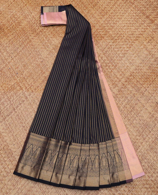 Black Budget Silk Saree, Spotlighted with Zari Buttas All Over Its Body, Highlighted by Traditional Zari Designs Woven Border, Contrast Grand Pallu and Paired with a Contrast Blouse