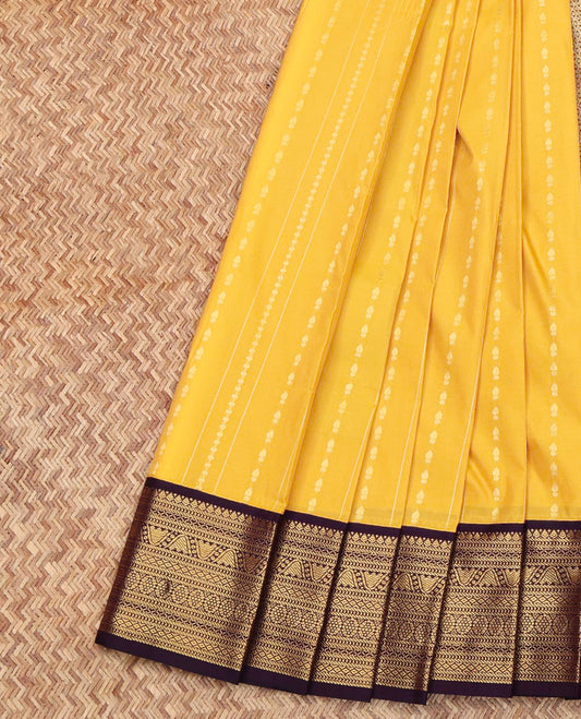 Yellow Budget Silk Saree, Subtly Sparkled With Zari Stripes All Over Its Body, Complemented by Contrast Traditional Zari Designs Woven Border, Grand Jaal Pallu, and Paired with a Contrast Blouse