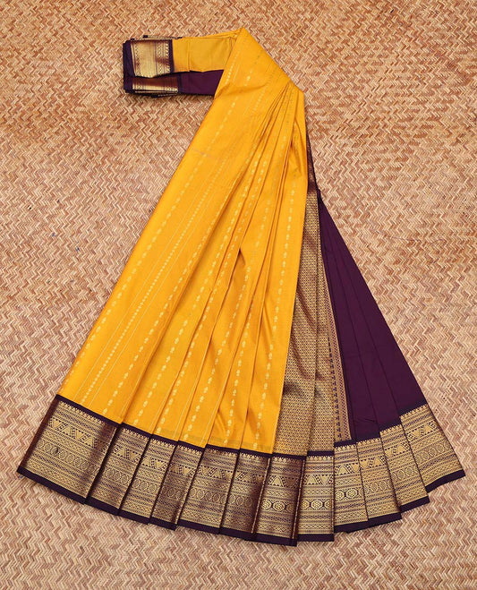 Yellow Budget Silk Saree, Subtly Sparkled With Zari Stripes All Over Its Body, Complemented by Contrast Traditional Zari Designs Woven Border, Grand Jaal Pallu, and Paired with a Contrast Blouse