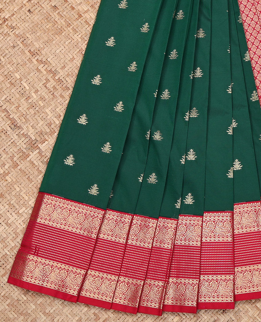 Dark Green Budget Silk Saree, Featuring Zari Buttas All Over Its Body, Complemented by a Contrast Traditional Zari Design Border, Grand Jaal Pallu, and Paired with a Contrast Blouse