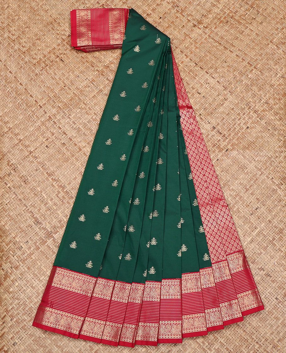 Dark Green Budget Silk Saree, Featuring Zari Buttas All Over Its Body, Complemented by a Contrast Traditional Zari Design Border, Grand Jaal Pallu, and Paired with a Contrast Blouse