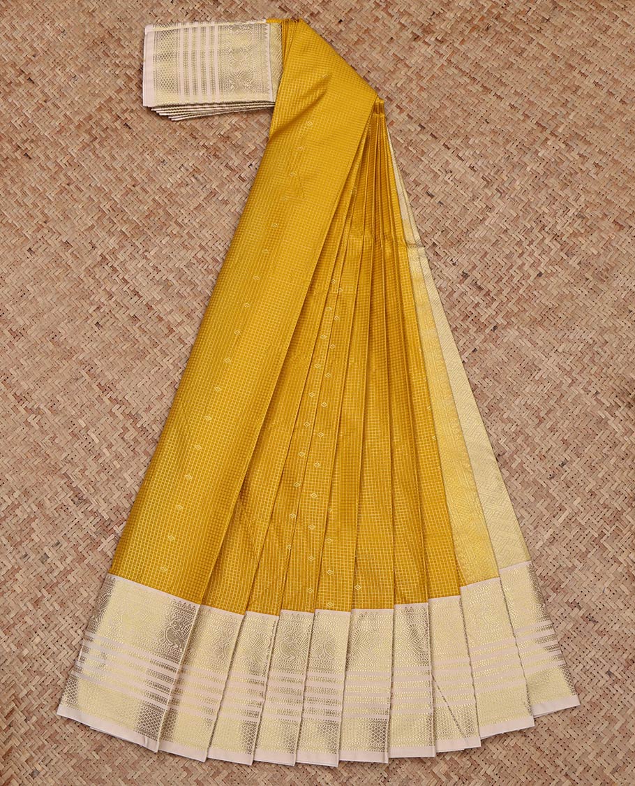 Yellow Budget Silk Saree, Sparsely Woven with Zari Buttas and Zari Checked on Its Body, Complemented by a Contrast Traditional Zari Design Border, Grand Pallu, and Paired with a Contrast Blouse