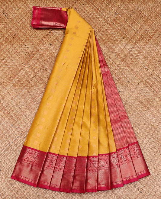 Yellow striped and peacock chakra buttas gift saree, contrast traditional zari design border, and jaal pallu