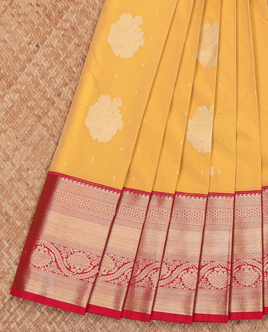 Yellow Budget Silk Saree, Subtly Sparkled with Buttas All Over Its Body, Complemented by a Contrast Traditional Zari Border of Floral Creeper Designs, Elegantly Highlighted Pallu of Ogee Patterns, and Paired with a Contrast Blouse