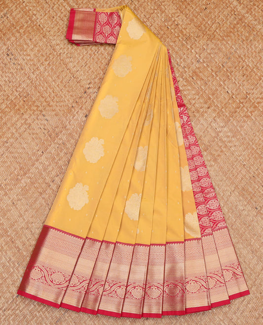 Yellow Budget Silk Saree, Subtly Sparkled with Buttas All Over Its Body, Complemented by a Contrast Traditional Zari Border of Floral Creeper Designs, Elegantly Highlighted Pallu of Ogee Patterns, and Paired with a Contrast Blouse
