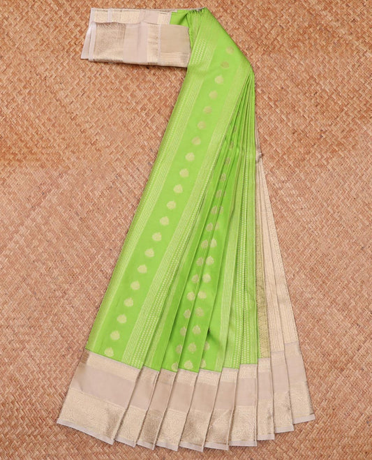 Green Budget Silk Saree Ornamented with Zari Buttas, Complemented with a Contrast Traditional Zari Design  Border, Featuring a Pallu Steeped with Traditional Designs, and a Contrast Blouse
