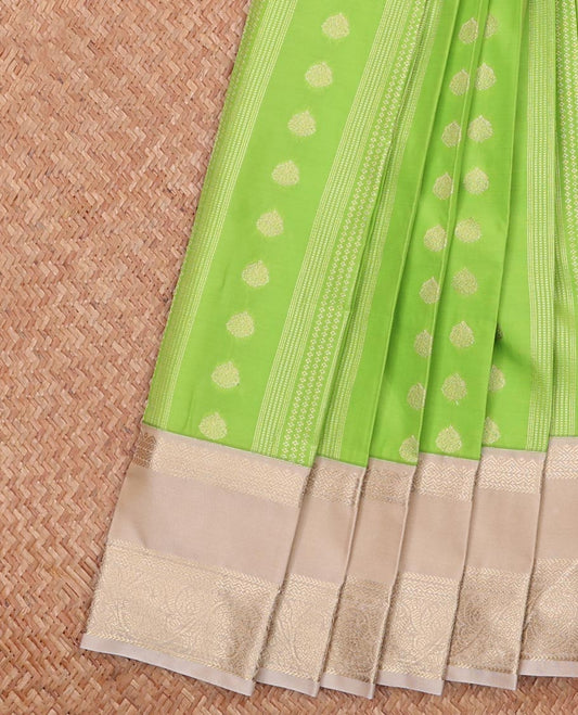 Green Budget Silk Saree Ornamented with Zari Buttas, Complemented with a Contrast Traditional Zari Design  Border, Featuring a Pallu Steeped with Traditional Designs, and a Contrast Blouse