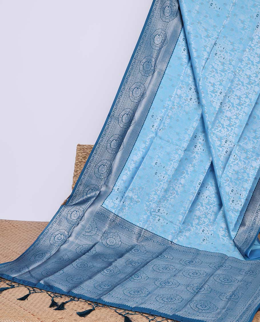 Green floral butter silk saree with contrast floral design border & pallu of floral jaal design
