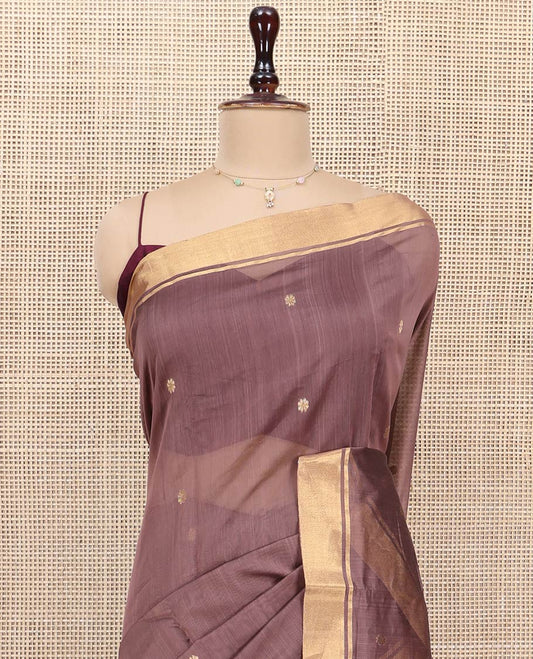 Brown Chanderi Cotton Saree, Bedecked with Floral Buttas All Over Its Body, Highlighted by a Zari Border, Captivating Contrast Pallu of Floral Jaal Designs, and Paired with a Contrast Blouse