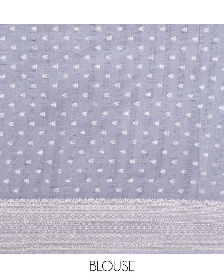 Grey floral motifs fancy crepe saree with self intricate zari design border & floral design pallu