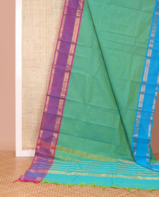 Green striped Chettinad cotton saree, contrast ganga jamuna rettai pettu traditional zari border, and pallu of stripes