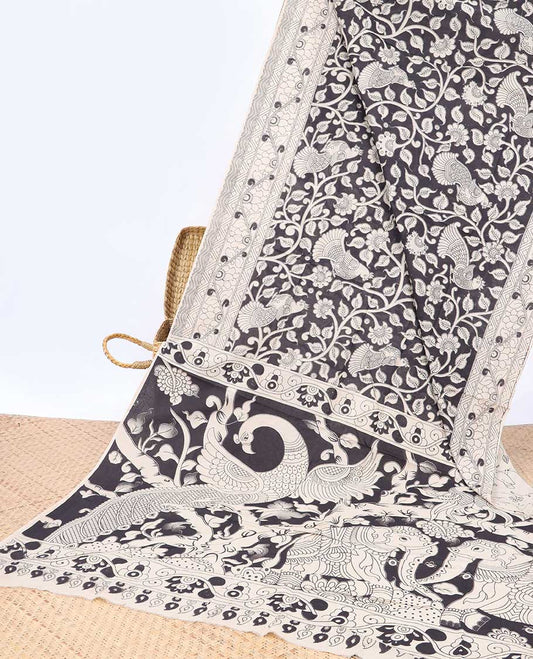 Black floral machine printed kalamkari cotton saree, self-border & animal motifs printed border