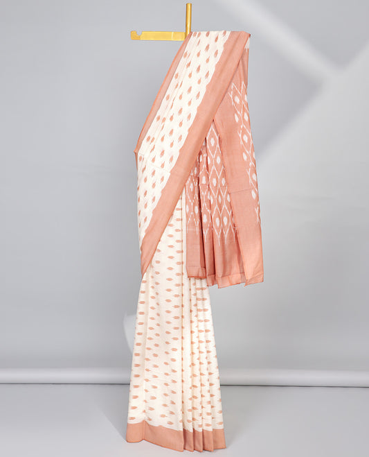 Cream motifs ikkat cotton saree with contrat plain border & ogee design pallu