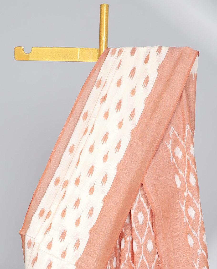 Cream motifs ikkat cotton saree with contrat plain border & ogee design pallu