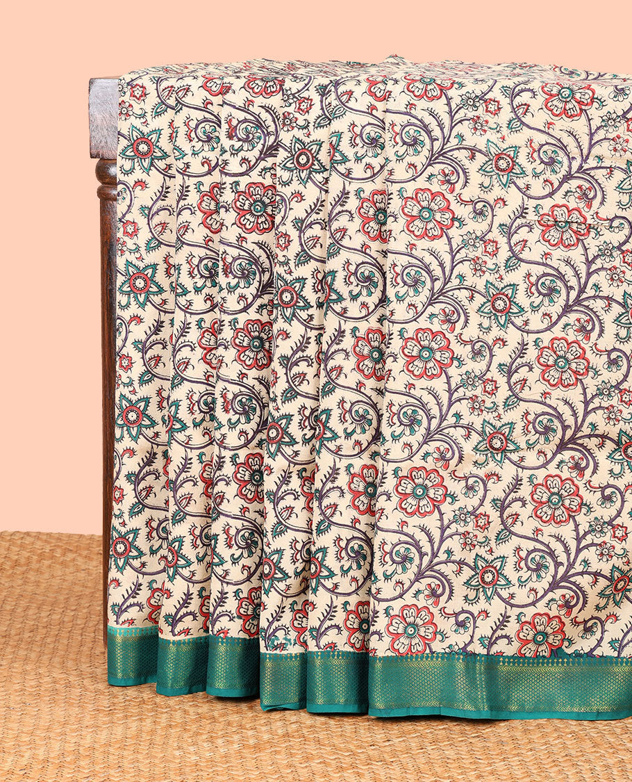 Cream floral vine design machine-printed kalamkari cotton saree with contrast zari design border & animal motifs pallu